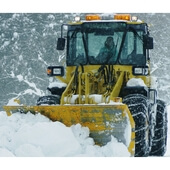 Hydraulic distribution with snow plough control unit
