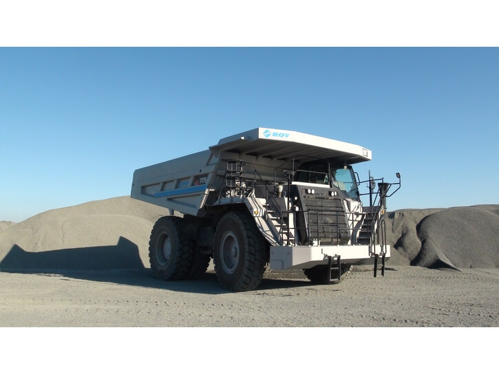 Dump truck with water-based dust suppression