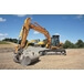 Tracked excavator with hydraulic quick couplers
